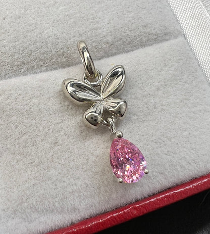 Dije Mariposa Oro Blanco 14kt con Zirconia Rosa